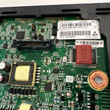 Close-up of a green circuit board with various electronic components.